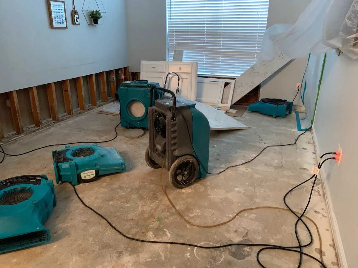 Dehumidifier in flood-cut room for Water Damage Restoration in Wolf Trap